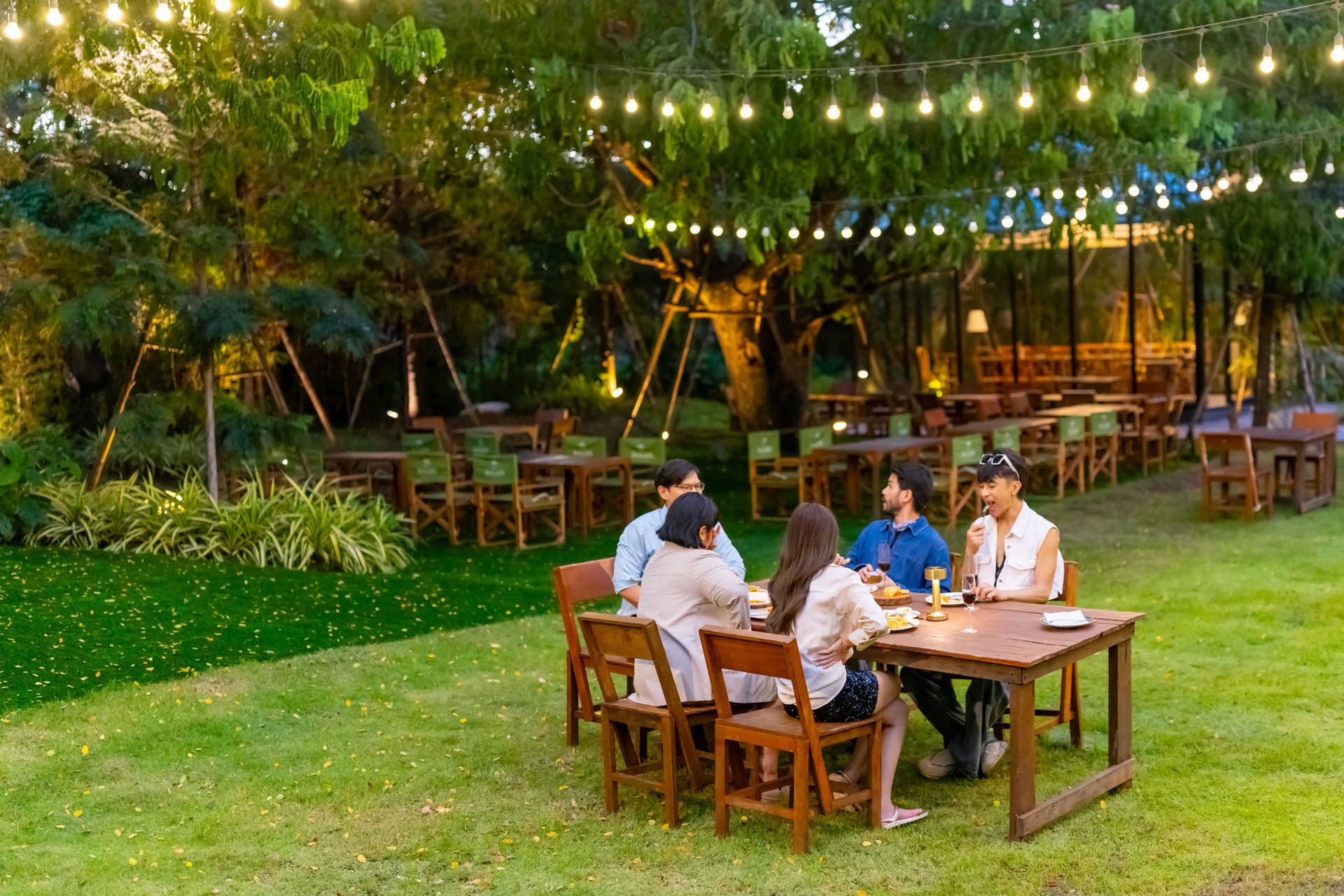 Group of Asian people friends having celebration dinner party together.